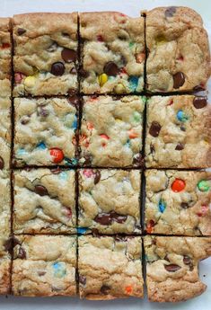 chocolate chip cookies with m & m candy bars cut into squares