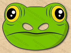 a green frog face with yellow eyes