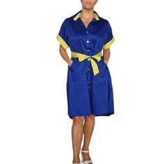 Elevate Your Wardrobe With This Stunning Women's Chic Blue Shirt Dress. The Dress Features A V-Neckline, 3/4 Sleeves, And A Tie Closure For A Casual Yet Chic Look. The Contrast Trim And Belted Waist Add A Pop Of Color And Style To The Blue Cotton Material. Perfect For Both Party/Cocktail And Casual Occasions, This Shirt Dress Is A Must-Have For Any Fashion-Forward Woman's Wardrobe. Available In One Size, This Dress Is Perfect For The Summer And Fall Seasons. Add A Touch Of Elegance To Your Outfi Blue Collared Summer Dress, Casual Blue Shirt Dress With Tie Waist, Blue Knee-length Shirt Dress For Beach, Blue Short Sleeve Shirt Dress For Beach, Blue Summer Shirt Dress, Blue Summer Shirt Dress For Day Out, Summer Blue Shirt Dress For Daywear, Blue Short Sleeve Shirt Dress For Day Out, Blue Short Sleeve Shirt Dress For Daywear