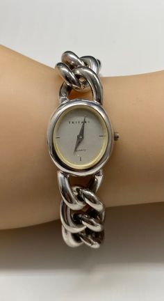 Beautiful Vintage Trifari Watch Chunky Heavy Silver Tone Watch Bracelet ladies watch pre/owned working condition new battery installed measures 7.5" length by 7:8" width Luxury Vintage Silver Watch Accessories, Cheap Vintage Metal Watches, Cheap Vintage Watches With Bracelet Strap, Vintage Trifari, Watch Bracelet, Women Wrist Watch, Ladies Watch, Wrist Watches, Bracelet Watch