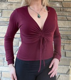 This versatile piece is made from super soft and stretchy 95/5 organic cotton/lycra blend. It is fully lined making it thick and warm. Offered in one versatile size that will fit a 36-50” bust. Great for all bust sizes. Adjustable drawstring helps accommodate to different body types. Great with my Fit to Flare skirt, Amazebells or Palazzo Pants. Also so cute with jeans. Made from scratch! Please allow 2 weeks for production. Fitted Ruched Tops For Winter, Winter Ruched Fitted Tops, Winter Fitted Ruched Tops, Fall Drawstring Stretch Top, Fall Stretch Drawstring Top, Ruched Cotton Top For Fall, Fall Cotton Ruched Top, Fall Top With Drawstring Tie, Fitted Long Sleeve Top With Drawstring