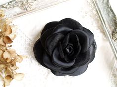 "Beautiful, delicate satin camellia flower with golden silk /satin/ fabric, perfect for wedding and parties. This flower brooch is the perfect addition to your outfit. It looks stunning on hats, jackets, dresses, scarfs, purses and clutches alike. Size: approx. /shown in picture/ 4\" (~10 cm) in diameter. If you need a flower of a different colour, or more than one flower, let me know! To see more flower brooches and hair accessories, just click the link: https://www.etsy.com/shop/MyFlowerAccess Elegant Rosette Brooches As A Gift, Elegant Rosette Brooches For Party, Elegant Rose Design Brooch, Elegant Flower Brooches With Rose Design, Elegant Rosette Wedding Brooches, Elegant Rose Brooches With Handmade Flowers, Elegant Rose Brooch With Handmade Flowers, Elegant Rose Brooches For Wedding, Elegant Evening Brooches With Handmade Flowers