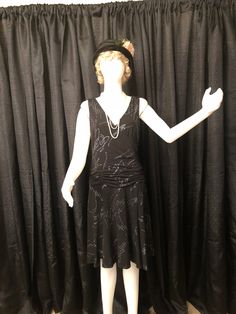 "Black 1920's Style Dress with Silver Glitter Designs. It has the classic drop waist style of the 1920's and was probably made in the 1990's.  This dress has no zipper so you have to pull it on over your head.  It is made of Polyester and Elastine.  The color is black even though some of the photos make it look more gray! This is a very comfortable and easy to wear dress. Excellent Wearable Condition! The label is \"Liz Jordan.\" Size 12. The length of the dress from shoulder to hem is 39 inches Vintage Dresses 1920's, Orange Cocktail Dresses, 1920s Fashion Dresses, 1920 Dress, Flapper Style Dresses, 1920's Style, Metallic Gold Dress, Vintage Red Dress, 1920s Flapper Dress