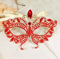 FAST & FREE SHIPPING DURABLE QUALITY: This Crystal Masquerade Mask is made of high-quality alloy and rhinestone diamond. They are manual workmanship, very comfortable to wear. ELEGANT DESIGN: The masquerade mask is encrusted shinny diamond rhinestone and crystal. The intricate and delicate are very glamorous, elegant and luxury. PRINCESS STYLE: You will be the center of attraction at party when you wear the princess style fancy mask. VARIOUS OCCASION: The masks are perfect for Masquerade party, Mardi Gras Prom, Red Masquerade Mask, Red Masquerade, Fancy Mask, Masquerade Ball Party, Costume Masquerade, Prom Fashion, Gold Eye Mask, Carnival Themed Party