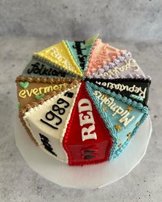 a cake decorated with different types of candies