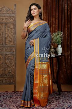 Indulge in the timeless elegance of the Bomkai Silk Saree, also known as Sonepuri Silk. This traditional weave from Odisha features intricate golden zari work, adding a touch of opulence to the Lava Grey color. Crafted in soft silk, this saree is lightweight and comfortable, making it perfect for any occasion. The zari border adds a stunning contrast to the overall design, enhancing its beauty. Each saree comes with a matching blouse piece, ensuring a complete and effortless look. Elevate your ethnic wardrobe with this exquisite Bomkai saree.Saree Length : 5.5 Mtr Blouse Piece Length : 0.8 Mtr Design : Bomkai Fabric : Blended Silk Wash Care : Dry Clean Get this exclusive bomkai soft silk saree online at Craftyle - The best online store for pure silk saree, tussar silk saree and cotton sare Gold Cotton Silk Saree With Traditional Patterns, Gold Paithani Silk Traditional Wear For Eid, Gold Cotton Silk Saree With Weaving Work, Transitional Season Gold Paithani Silk Traditional Wear, Cotton Silk Traditional Wear For Puja And Diwali, Elegant Traditional Wear With Weaving Work For Eid, Gold Traditional Wear With Traditional Patterns For Navratri, Eid Elegant Traditional Wear With Weaving Work, Traditional Cotton Silk Wear With Weaving For Festivals