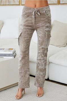 These crushed velvet cargo crinkle joggers are made from a premium fabric for an ultra-soft and luxurious feel. Featuring a classic cargo design with multiple pockets, these joggers provide ample storage and a perfect fit. Functional front, back and side pockets Drawstring waist band Straight leg Details Made in Italy Care Instructions: Machine wash Fabric: 75%Viscose, 20% Nylon 5% Elastic Welcome to Milio Milano! We are a classic contemporary brand manufactured in Italy, dedicated to giving you Cargo Design, Crushed Velvet, Waist Band, Industrial Style, Drawstring Waist, Quality Fabric, Care Instructions, Straight Leg, Perfect Fit