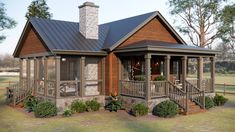 a small cabin style home with porch and covered patio