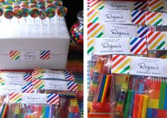 there are many different colored lollipops in the box and on the table