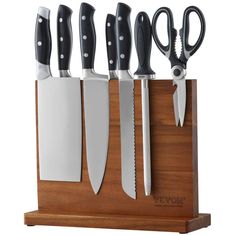 a set of knives in a wooden holder with black handles and blades on each side