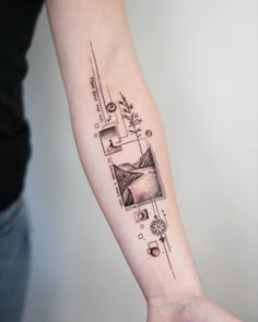 a person with a tattoo on their arm that has an image of mountains and trees