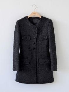 Longer length tweed jacket with button through front and pocket details. Model is wearing a MINUSEY S. ✔️ Free worldwide express shipping over $100✔️ Loved by 6,500+ customers✔️ Limited edition collections, maximum style⠀⠀⠀⠀⠀⠀⠀⠀⠀Stay ahead of the trend with can’t-find-anywhere-else staples. Your closet will thank you 💕* MINUSEY S = EU 34, US 2* MINUSEY M = EU 36, US 4* 10% Wool/Fur / 90% Polyester* Dry clean* Made in Korea - Model Height: 173cm/5'8" (US4, EU36) Fall Luxury Long Sleeve Tweed Dress, Classic Tweed Outerwear With Buttoned Pockets, Luxury Tweed Dress For Workwear In Fall, Winter Tweed Blazer With Buttoned Pockets, Black Long Tweed Jacket With Pockets, Black Long Sleeve Tweed Jacket With Pockets, Tweed Outerwear With Buttoned Pockets For Fall, Black Tweed Jacket With Buttons, Fall Tweed Outerwear With Buttoned Pockets