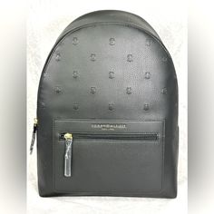 Elevate Your Everyday Look Carrying The Stylish Tommy Hilfiger Amelia Ii Medium Dome Backpack-Embossed Th Serif Critter Pvc. Crafted From Pebbled Pu Material, This Spacious Bag Features Zippered Closure, One Carry Handle, And Dual Adjustable Shoulder Straps. It Has One Zippered Interior Pocket And One Slip-In. Sku: #9943071 One Zippered Exterior Pocket. Nylon Lining. Imported. Measurements: Bottom Width: 12 12 In Height: 35 In Weight: 1 Lb 1.67 Oz Tommy Hilfiger Backpack Black, Tommy Hilfiger Luggage, Tommy Hilfiger Backpack, Tommy Hilfiger Bag, Tommy Hilfiger Bags, Trendy Backpacks, Flap Backpack, Tommy Hilfiger Logo, Medium Backpack