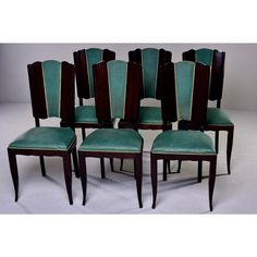 six chairs with green upholstered back cushions