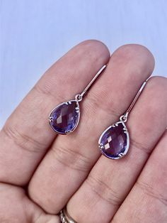 Amethyst Earrings, February Birthstone, Purple Teardrop Gem Earrings in Gold or Silver, Purple Jewelry, Lavender Earrings, Gift for women These small but gorgeous earrings feature deep purple amethyst teardrops bezel framed in either 14k gold filled or sterling silver. The teardrops are suspended form lever back ear wires in the finish of your choice. These are small, delicate and dainty earrings but with a gorgeous lavender color sure to match many outfits. Ideal for a girl or a women that like Elegant Amethyst Teardrop Dangle Earrings, Purple Gemstone Teardrop Earrings, Elegant Lavender Earrings With Ear Wire, Purple Sterling Silver Teardrop Earrings, Elegant Purple Teardrop Crystal Earrings, Purple Gemstone Teardrop Dangle Earrings, Purple Teardrop Gemstone Earrings, Lavender Teardrop Earrings With Ear Wire, Amethyst Teardrop Crystal Earrings