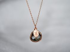 This beautiful black diamond necklace would be a perfect gift for a wedding, birthday, anniversary, graduation or for any occasion. The rose gold (as shown) gold or silver plated black diamond pendant is made of gorgeous charcoal color glass. It measures approximately 12.5x 16 mm and is hung on a 16", 18" or 20" rose gold, gold, or silver plated chain. Please add your chain length to the personalization section. If not added then we will include an 18" chain. The chains are dainty and very prett Diamond Necklace Gift, Black Diamond Pendant, March Birthstone Necklace, Promise Necklace, Black Diamond Necklace, Unique Valentines Day Gifts, Gray Necklace, Necklace Initial, Necklace For Girlfriend