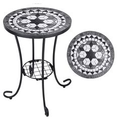 two black and white mosaic table tops with wrought iron stands on each side, one holding an umbrella