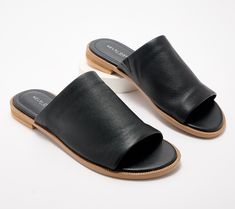 Slide these genuine leather sandals right into your cart! Their modern, minimalistic design makes them your go-to shoe for pairing with everything in your sunny-season closet. From Kelsi Dagger. Classic Leather Slides For Spring, Leather Sandals With Textured Sole For Spring, Classic Slides With Leather Footbed For Spring, Spring Leather Sandals With Leather Lining, Modern Single Toe Strap Slides For Summer, Modern Summer Slides With Single Toe Strap, Leather Sandals With Leather Lining For Spring, Classic Leather Flat Slingback Sandals, Modern Slides With Single Toe Strap For Summer