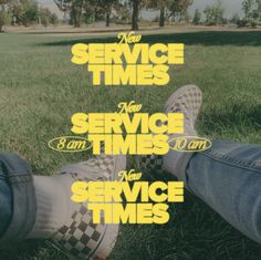 someone is sitting in the grass with their feet up and there are two service times written on them