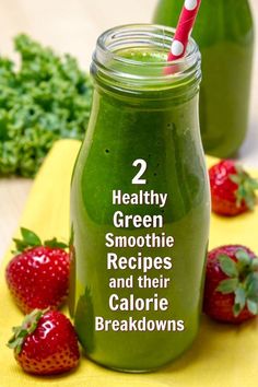 two green smoothies with strawberries on the side