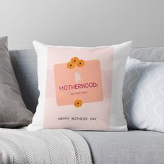 a mother's day pillow on a couch