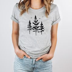 Pine Tree Shirt | Evergreen Tree Shirt | Camping Tshirt | Nature Lover Gift | Forest Shirt | Adventure Outdoors Tee | Gift For Her Women Men UNISEX High quality premium shirts PRINTED IN CANADA 🍁 USA 🇺🇸 AUSTRALIA 🇦🇺 UK 🇬🇧 & EUROPE for faster shipping. 🇨🇦 CANADIAN SHOPPERS 🇨🇦 All orders are printed and shipped directly from our print shop in Alberta or our Ontario print shop depending on stock. For USA, AUSTRALIA, UK & EUROPE 🌏 We will ship directly from our nearest partner facility f Camping Tshirt, Tree Shirt, Evergreen Trees, Gifts For Nature Lovers, Pine Tree, Body Fit, Print Shop, Nature Lover, Ontario