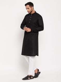 Vastramay Men's Black And White Cotton Blend Pathani Suit With White Pant Set This comfortable and stylish Pathani suit set from Vastramay is perfect for any occasion. Made from high-quality cotton blend fabric, it ensures all-day comfort and breathability. The set includes a black Pathani kurta with white piping details and matching white pants. Elevate your ethnic wardrobe with this classic ensemble. Features: Comfortable and stylish Pathani suit set for men Made from high-quality cotton blend Black Cotton Long Sleeve Kurta, Formal Black Cotton Kurta, Formal Cotton Sets With Pockets, Cotton Kurta For Work With Long Sleeves, Classic Cotton Kurta For Semi-formal Occasions, Elegant Cotton Kurta For Formal Occasions, Elegant Cotton Kurta For Semi-formal Occasions, Classic Fitted Cotton Kurta, Elegant Semi-formal Cotton Kurta