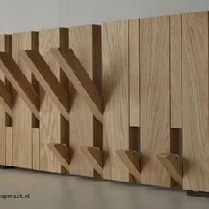 a wooden sculpture made out of wood strips