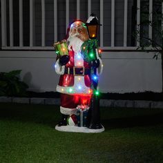 Santa Lamp Post With 22 LEDs HI-LINE GIFT LTD. Chevron Furniture, Wreath Indoor, Bird Bath Fountain, Santa Plate, Fairy Statues, Traditional Suit, Christmas Experiences, Christmas Chevron, Led Decor