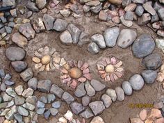 there is a heart made out of rocks