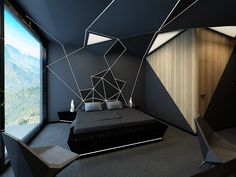 a modern bedroom with black walls and white geometric artwork on the wall, along with a large bed