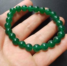 wholesale gemstone bracelet,beaded bracelet1.Material: green jade stone,Elastic thread2.Size of bead:approx  8mm,10mm,12mm,14mm,16mm, in size.length approx, 8", if other length, please tell me.3. this price is one bracelet.4. fit make earring /brooch/pendant/necklace ect jewelry,5.If you have speical requests, I'll be happy to do it for you.6.Returns:I accept returns.1)Send me an email within 7 days and let me know the item is being returned.2)I will refund your money after we recieve our mercha Green Jade Crystal Bracelet With 8mm Beads, Jade Stretch Bracelet With 8mm Beads, Green Stretch Bracelet With 8mm Beads, Earring Brooch, Man Bracelet, Elastic Thread, Bracelet Beaded, Pet Necklace, Jade Stone