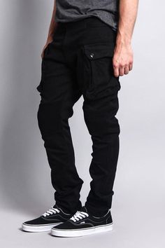 No need for tight pockets, these jeans have big cargo pockets to fit all of your goods. Every guy should have a great pair of cargo pants in their closet, to wear with just about anything. - 97% Cotton 3% Spandex - Zipper fly, button closure - Machine-wash cold inside-out with like colors, line dry - Imported. Designed in Los Angeles Skater Boy Outfits, Long Cargo Pants, Work Fits, Mens Jogger Pants, Skater Boy, Mens Cargo, Cargo Pocket, Men's Clothes, Mens Joggers