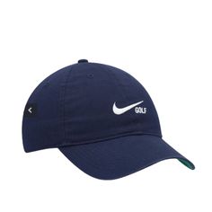 the nike golf cap is shown in blue and white, with an embroidered logo on the front