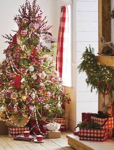 a christmas tree decorated with red, white and green ornaments