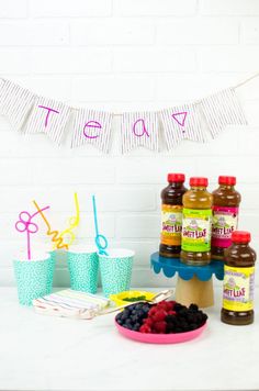 a table topped with lots of fruit and condiments