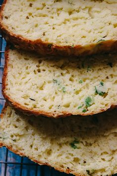 three slices of bread sitting on top of a cooling rack