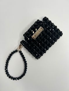 Black Rectangular Wristlet For Gift, Rectangular Black Wristlet For Gift, Rectangular Black Wristlet As A Gift, Black Beaded Pouch Clutch, Trendy Beaded Wristlet For Everyday Use, Trendy Wristlet Mobile Phone Bag Gift, Trendy Mobile Phone Bag Wristlet As Gift, Rectangular Beaded Coin Purse As Gift, Rectangular Beaded Coin Purse For Gift