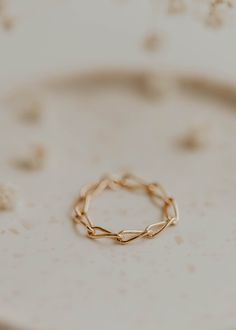 Here's to a chain ring that's your new BESTIE. The Maui Chain Ring has elongated and curbed chain links that create the perfect piece for a solo or stackable experience. Inspired by Jess + Adam's magical drive along The Road To Hana in Maui. 3mm chain width. Available in 14kt Gold Fill + Sterling Silver. Due to the making process, this ring may run +/- 1/4 size. In general, we recommend sizing up with our Chain Rings! Shown on Kimmie with Alyse Ring + Cleo Ring. Handmade in Eau Claire, WI. Our j Chain Link Ring As Gift, Link Chain Ring Gift, Metal Chain Link Ring As A Gift, Minimalist Chain Link Metal Rings, Minimalist Metal Chain Rings, Everyday Oval Link Chain Ring, Minimalist Metal Chain Promise Ring, Copper Uses, Everyday Wear Jewelry