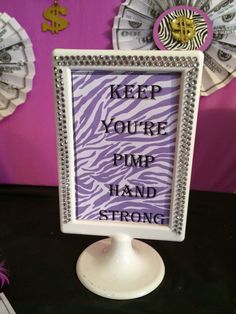 a sign that says keep you're pump hand strong on top of a table