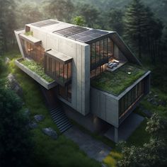 an aerial view of a house in the woods