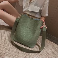 Megan Bag Material: PU Size(L*H*W): 24*28*16 Color: Brown, Black, Green, Beige, Khaki, Light Green Note: 1 Inch=2.54 CM; 1 CM=0.39 Inch , Due to different batches, bag's liner may be different. We pay your attention on the fact that different computer screens can display different colors even though this is one and the same color. Therefore color of the received good can be a little bit different than the good on the photo. Crocodile Handbags, Leather Backpack For Men, Plastic Shopping Bags, Real Leather Bags, Bucket Handbags, Pu Leather Bag, Women Shoulder Bag, Kelly Bag, Women Bags Fashion