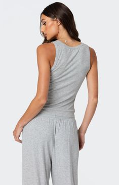 Online Only! Meet the Kylian Ribbed Tank Top from Edikted Loungewear, your new cozy essential. Crafted from a blend of cotton, polyester, and spandex, its ribbed fabric offers both comfort and style. Perfect for lounging or layering, this tank top effortlessly combines versatility and chic relaxation.


	Loungewear tank top
	Ribbed fabric
	Cotton, Polyester, Spandex
	Model wears size S
	Model height is 5'9
	Item care: Wash with similar color Ribbed Tank Top, Swimwear Dress, Ribbed Tank Tops, Ribbed Tank, Ribbed Fabric, S Models, Model Height, Pacsun, Fabric Cotton