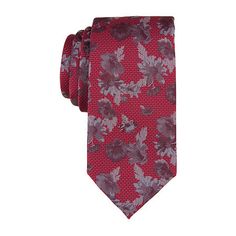 The Michael Strahan Chadwick Floral Tie exemplifies the classic elegance and quality of the Michael Strahan brand. Made from premium polyester, it offers a luxurious texture and lasting durability. The vibrant red floral pattern provides a sophisticated and stylish addition to any formal wardrobe. Pair it with a navy dress shirt and a charcoal suit for a polished, professional look.Measurements: 3 Width/Inches, 58 Length/InchesBase Material: 100% PolyesterCare: Dry Clean OnlyCountry of Origin: I Red Standard Tie For Semi-formal Occasions, Classic Red Neckwear With Ties, Red Semi-formal Necktie, Red Necktie For Semi-formal Occasions, Red Semi-formal Standard Tie, Elegant Red Neckwear With Ties, Elegant Fitted Red Neckwear, Elegant Red Standard Tie, Elegant Red Silk Tie