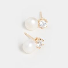 Baby Bliss Earring | SHASHI Pearl Studs Refined 14k Gold Earrings For Anniversary, Gold Timeless Bridal Earrings For Wedding, Timeless Yellow Gold Bridal Earrings, Refined Drop Earrings For Anniversary, Refined 14k Gold Round Earrings, Refined Gold Earrings For Anniversary, Delicate 14k Gold Earrings For Formal Occasions, Timeless Gold Pearl Earrings For Wedding, Refined Round Pearl Earrings As Gift