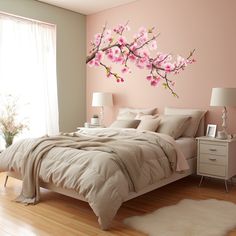 a bedroom with pink flowers painted on the wall