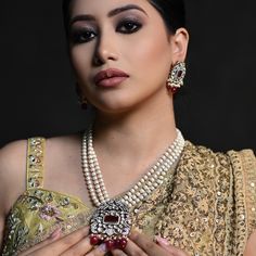 Timeless elegance with a touch of tradition. Our pearl and polki set adorned with semi-precious stones accents is perfect for making a regal statement. Embrace the heritage with Shivanshri’s exquisite collection. ✨👑 #RoyalElegance #TimelessBeauty #ShivanshriJewels#shivanshri#luxuryjewelry #viralreels#viral