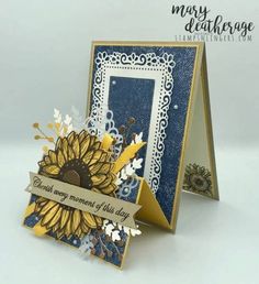 a close up of a card with a sunflower on the front and back side