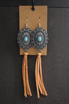 Fishhook backing. Measurements: Individual weight: 10g length: 13cm Western Leather Jewelry With Concho, Beaded Western Jewelry, Rustic Concho Jewelry For Rodeo, Leatherette Earrings, Handmade Western Turquoise Earrings, Handmade Southwestern Leather Earrings, Western Style Hand-tooled Leather Jewelry, Diy Western Jewelry, Leather Tassel Earrings