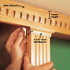 a man is working on an unfinished window frame with the words handyman above it